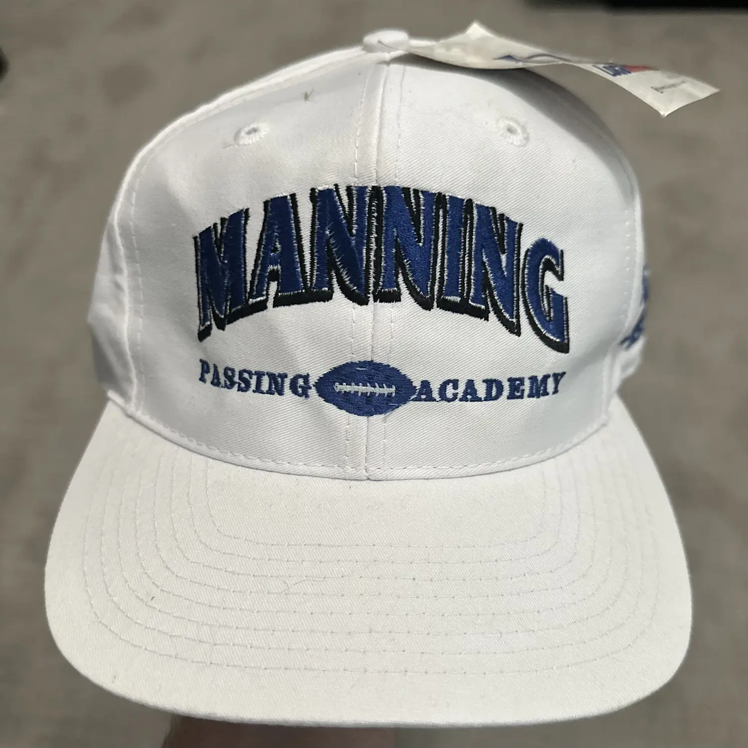 Manning logo 7 hat